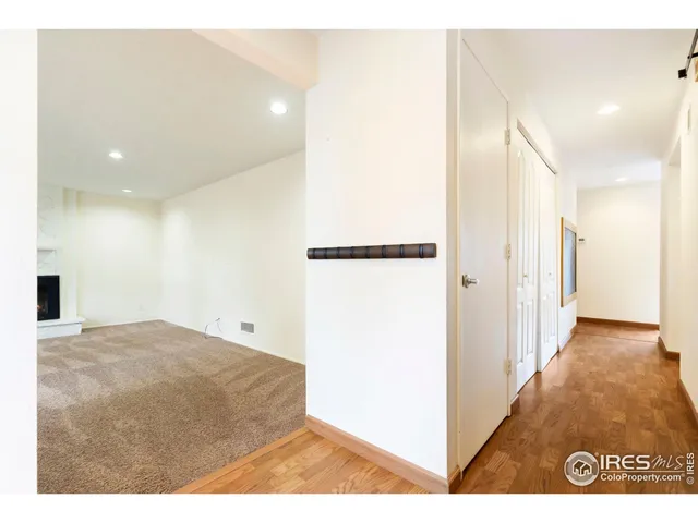 a view of a room with a hallway