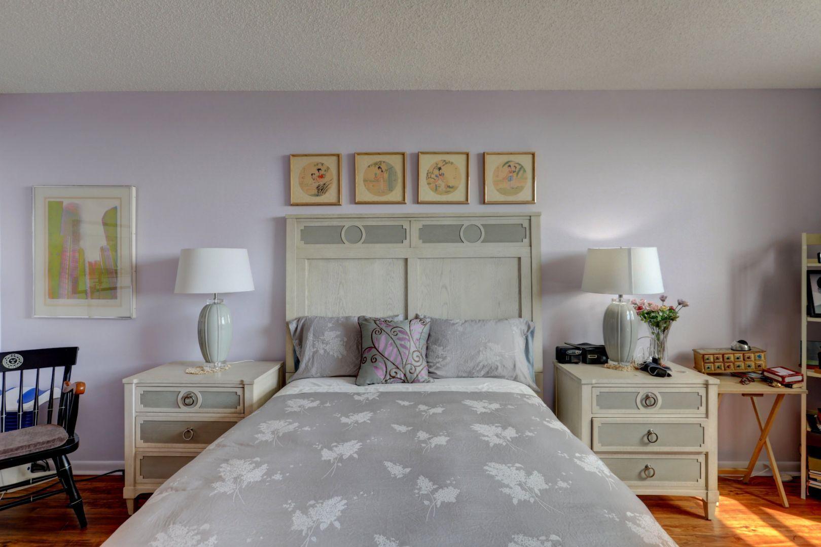 336 Golfview Road, Unit 601 North Palm Beach, FL 33408 - Photo 13 of 28 a bedroom with a bed and a lamp on dresser