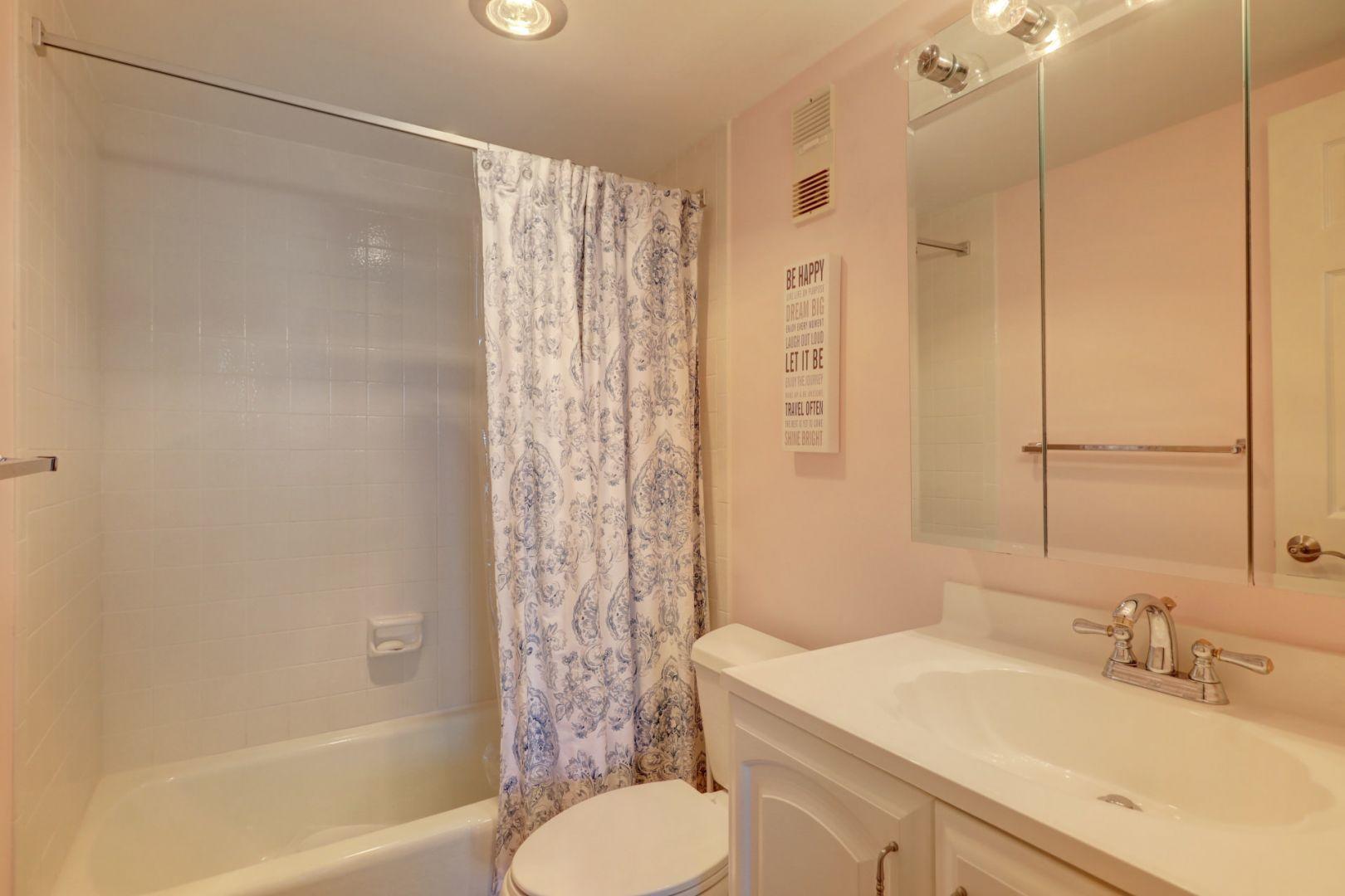 336 Golfview Road, Unit 601 North Palm Beach, FL 33408 - Photo 16 of 28 a bathroom with a sink toilet and shower