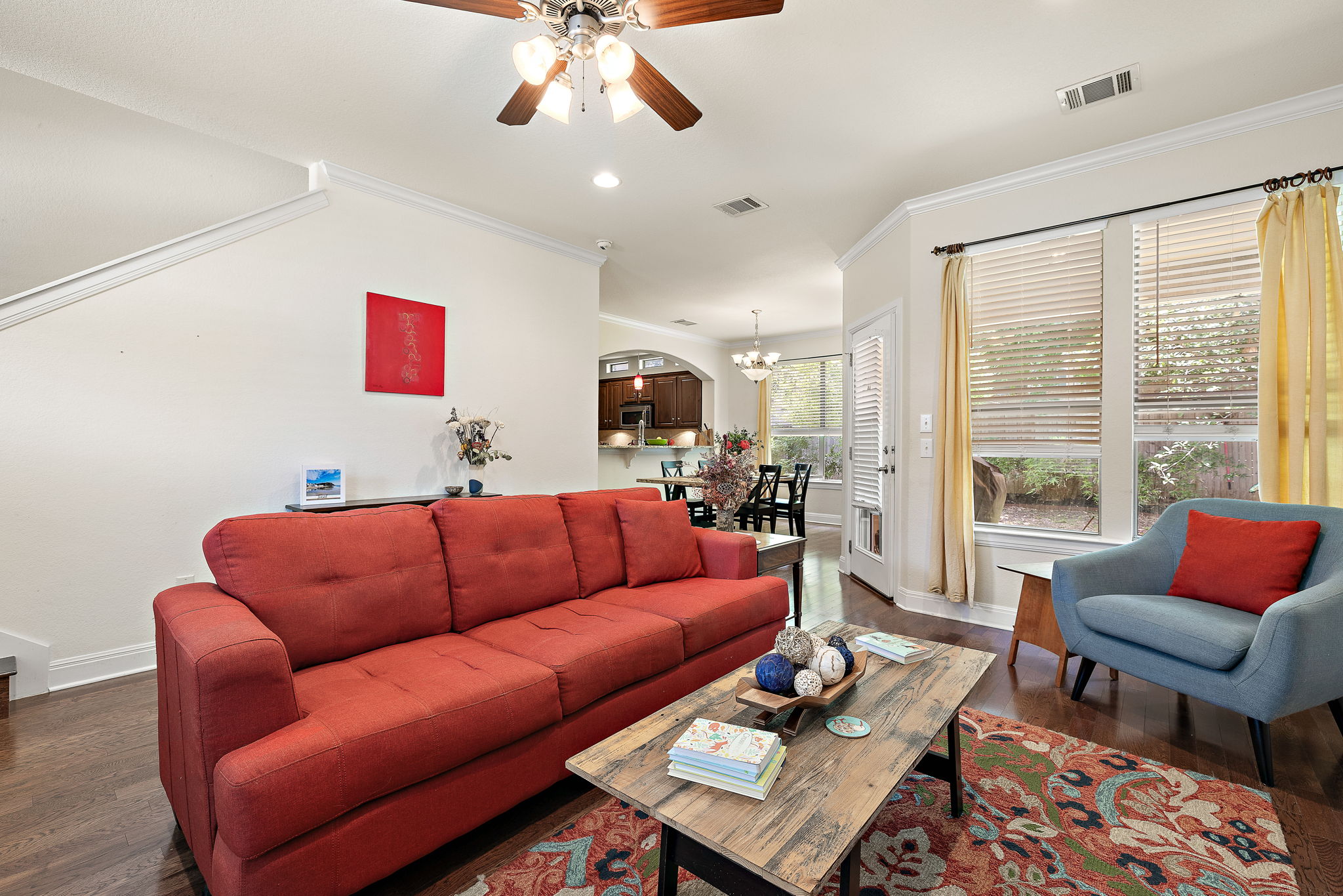 6708 Menchaca Road, Unit 10 Austin, TX 78745 - Photo 5 of 28 Open-concept living space featuring wood-finish flooring, recessed lighting, and a ceiling fan with light kit