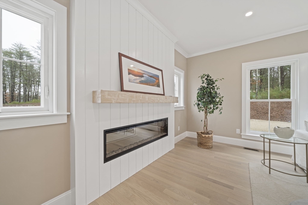 45 Red Gold Farm Road Marshfield, MA 02050 - Photo 10 of 40 a living room with furniture and a fireplace