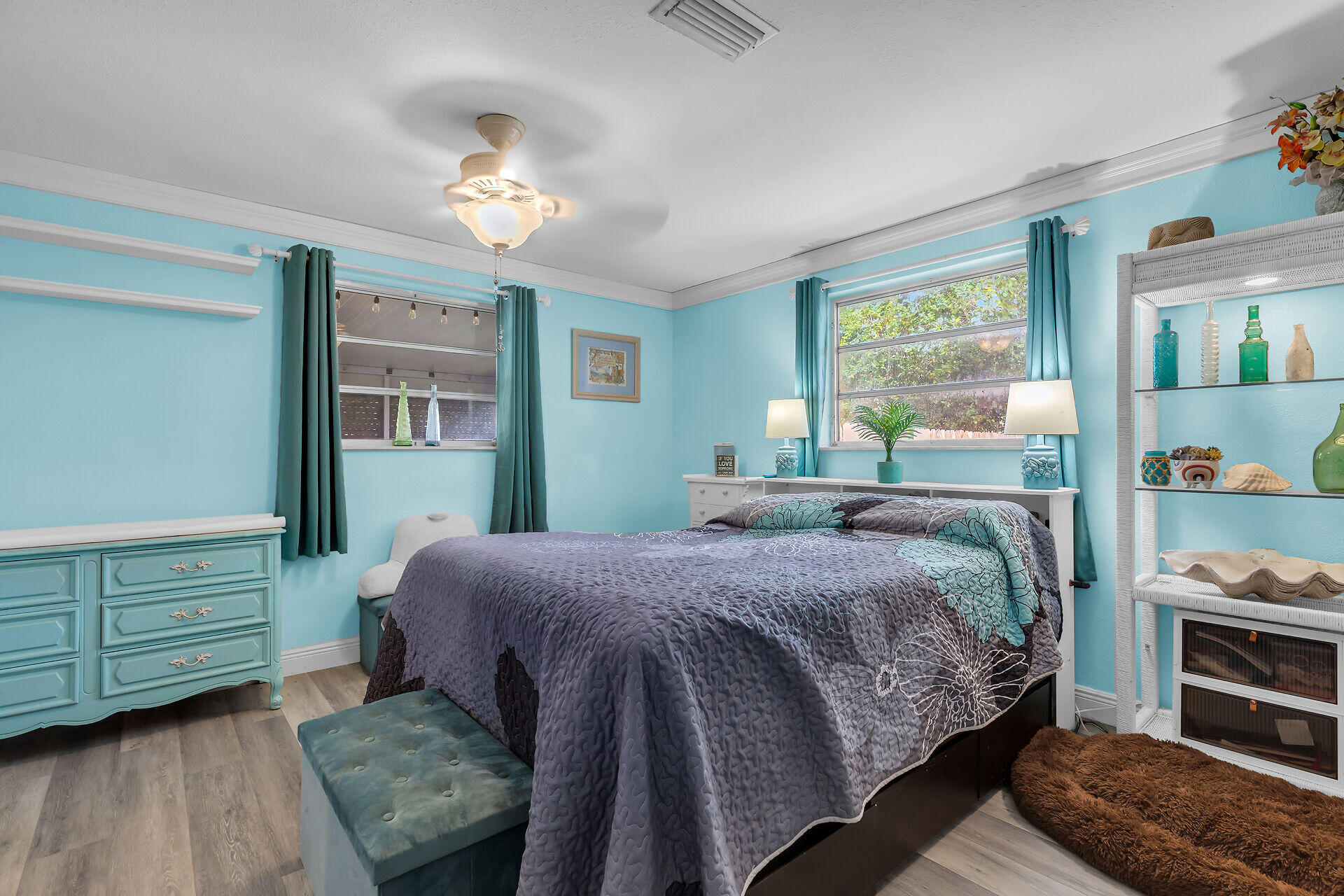 30 Jewfish Avenue Key Largo, FL 33037 - Photo 12 of 43 a bedroom with a bed and a dresser