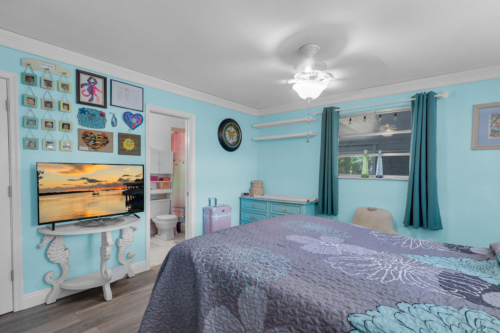 30 Jewfish Avenue Key Largo, FL 33037 - Photo 13 of 43 a bedroom with furniture and a flat screen tv