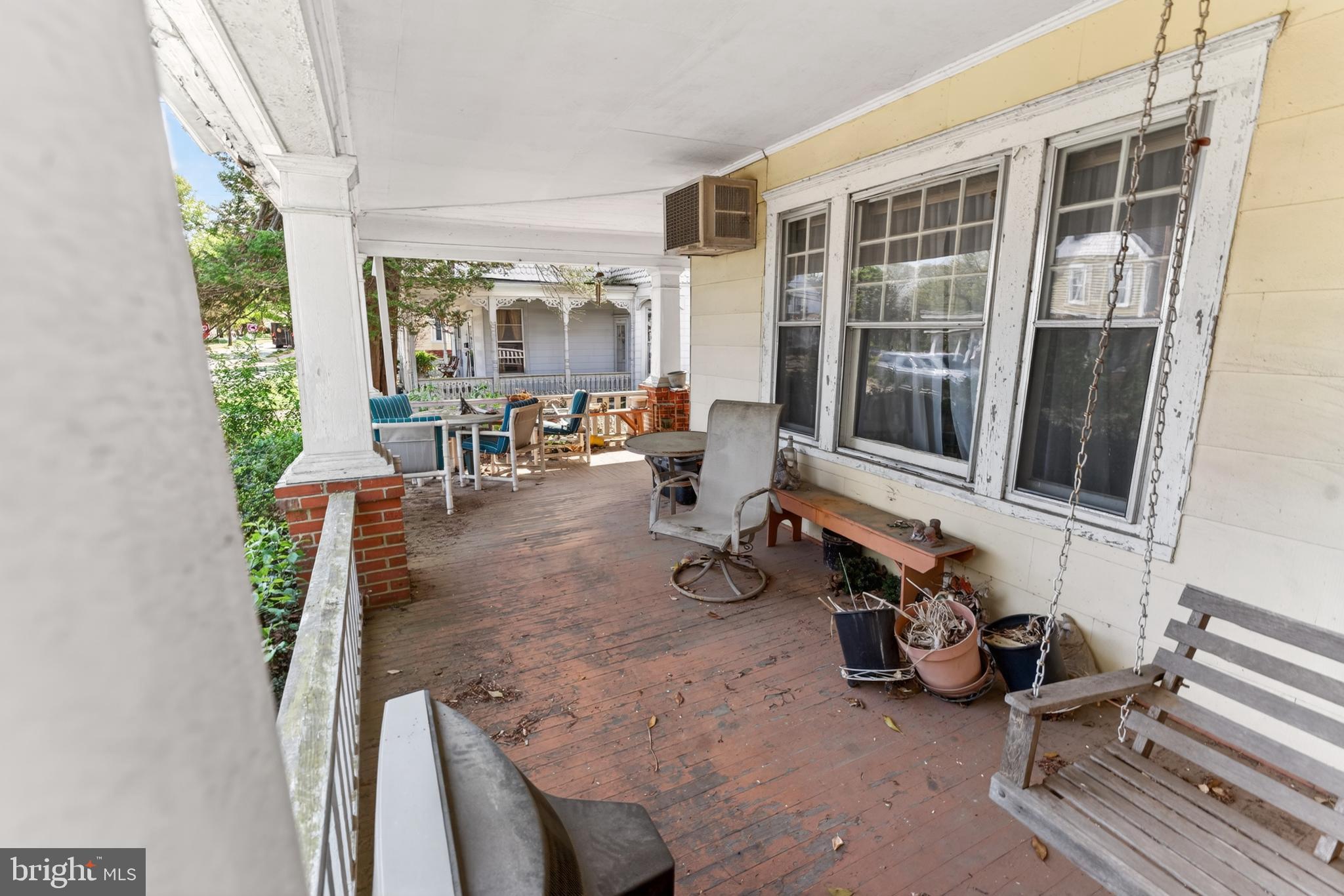 522 Market Street Denton, MD 21629 - Photo 14 of 49 a room with gym equipment and a large window