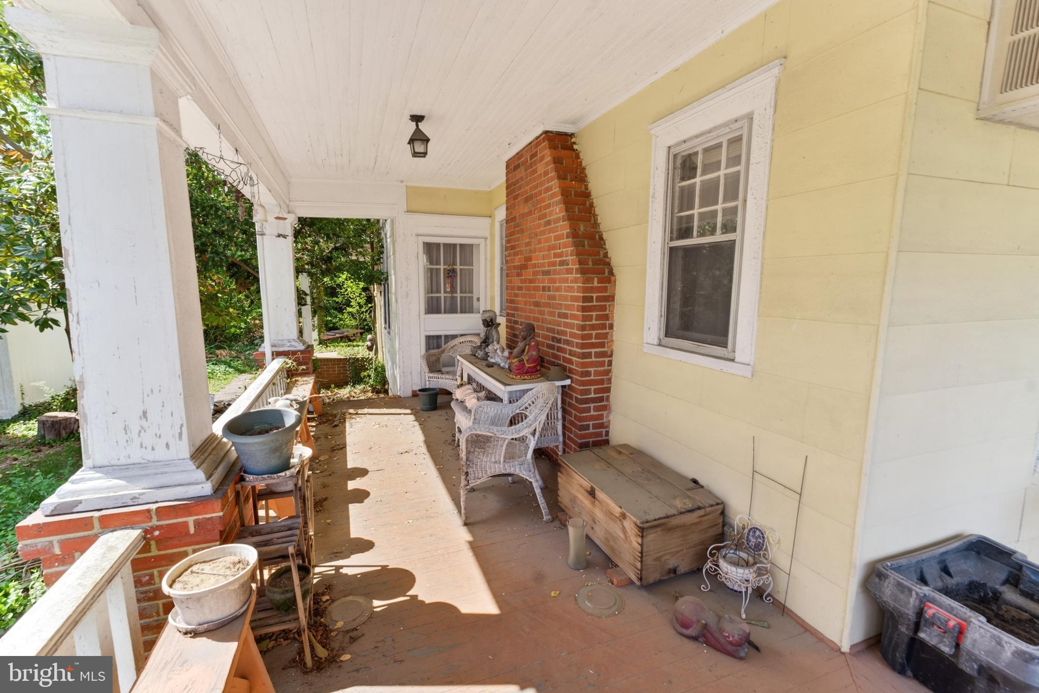 522 Market Street Denton, MD 21629 - Photo 17 of 49 a living room with furniture and a large window
