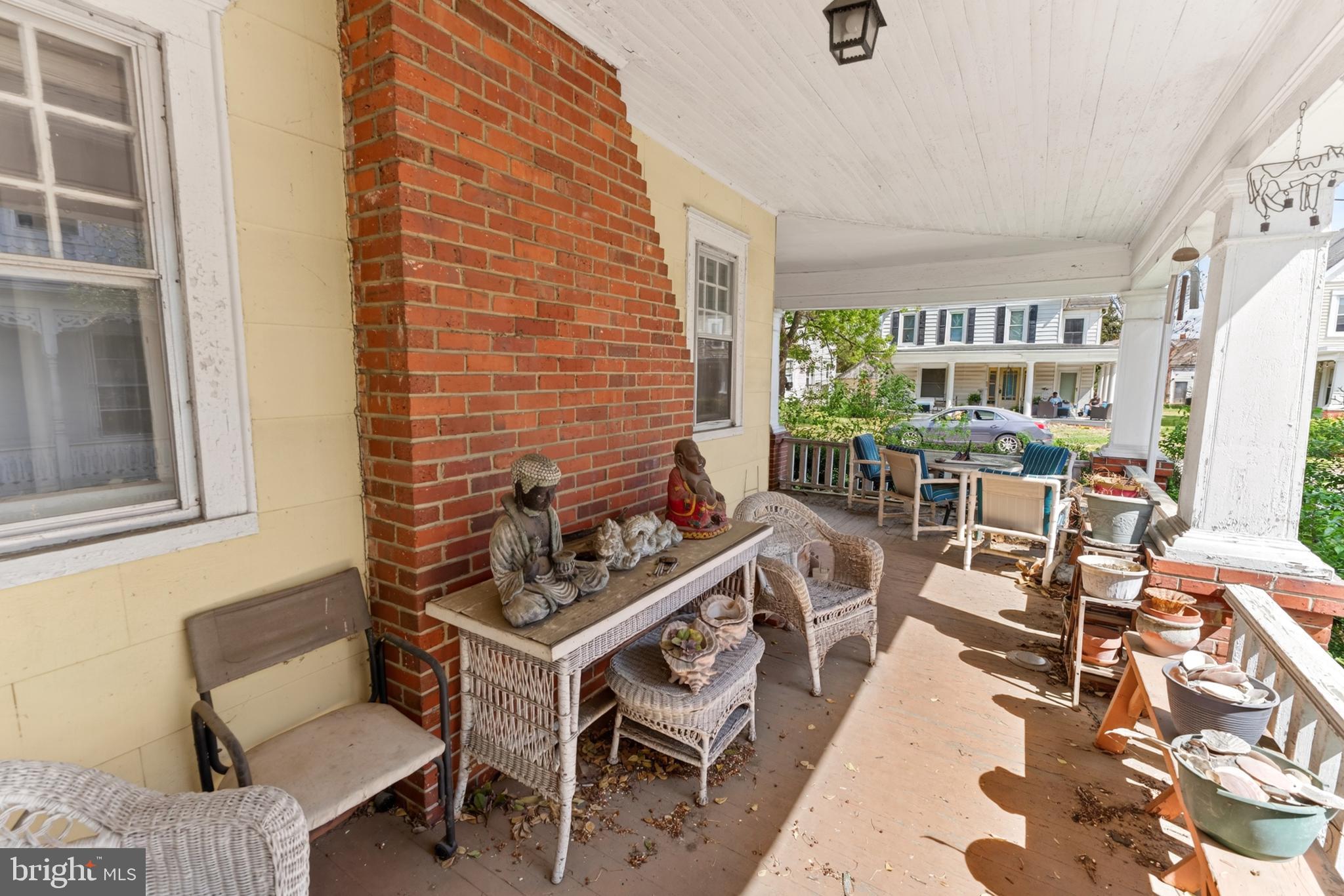 522 Market Street Denton, MD 21629 - Photo 18 of 49 a living room with furniture and a fireplace