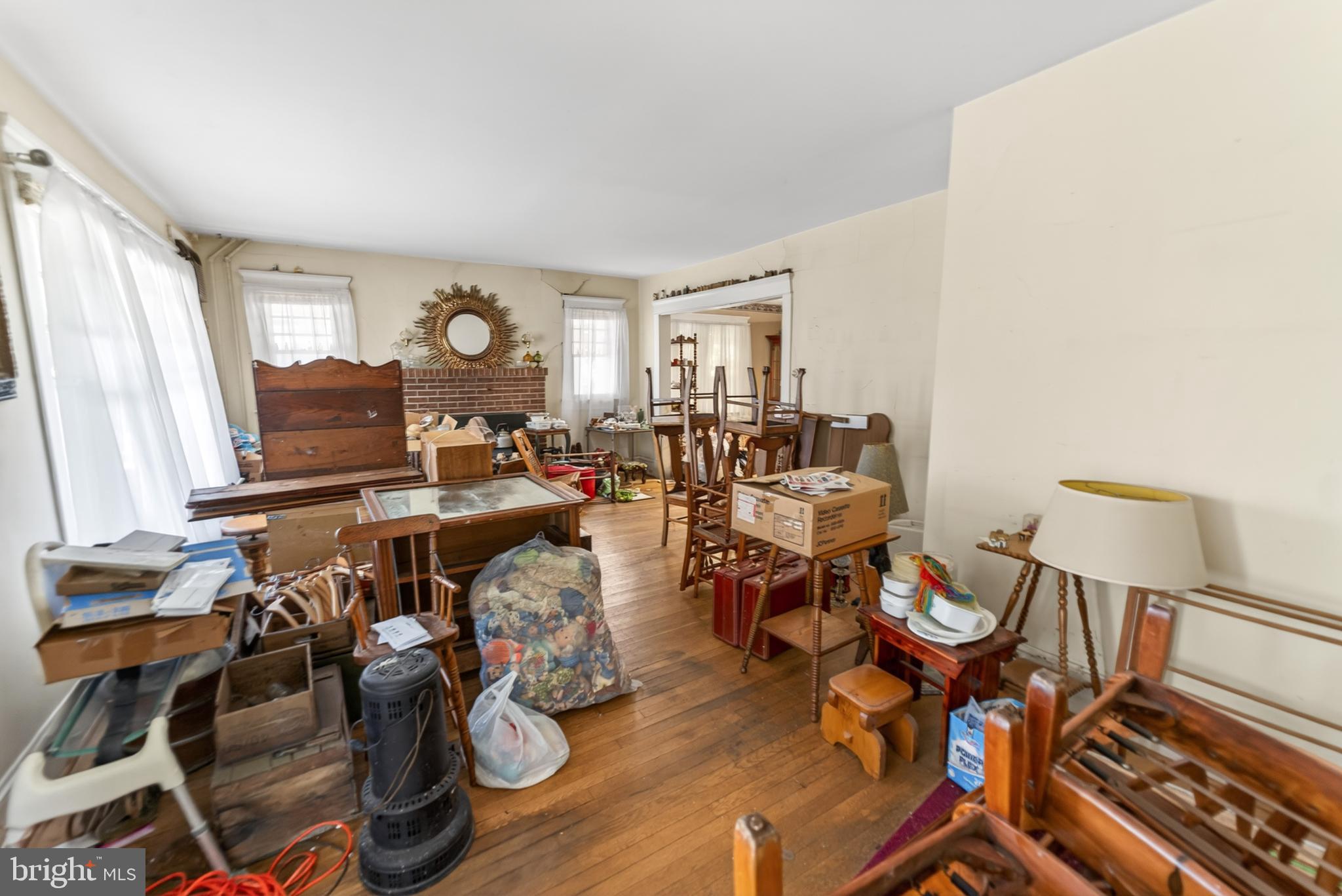 522 Market Street Denton, MD 21629 - Photo 20 of 49 a living room with lots of furniture and a large window