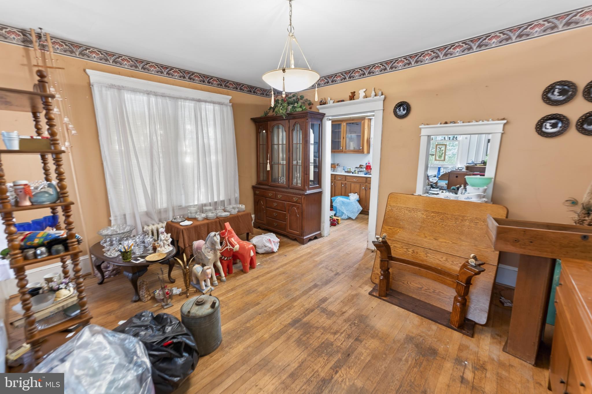 522 Market Street Denton, MD 21629 - Photo 23 of 49 a bedroom with furniture and wooden floor