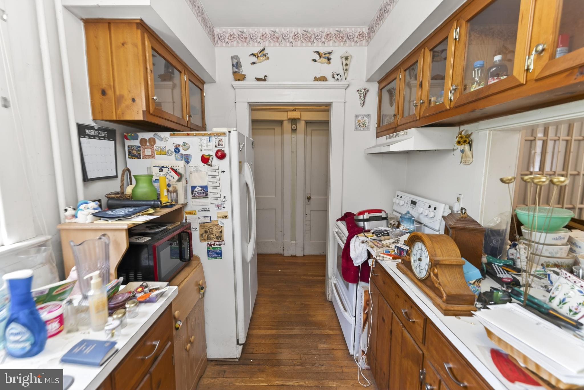 522 Market Street Denton, MD 21629 - Photo 28 of 49 a utility room with stainless steel appliances and cabinets