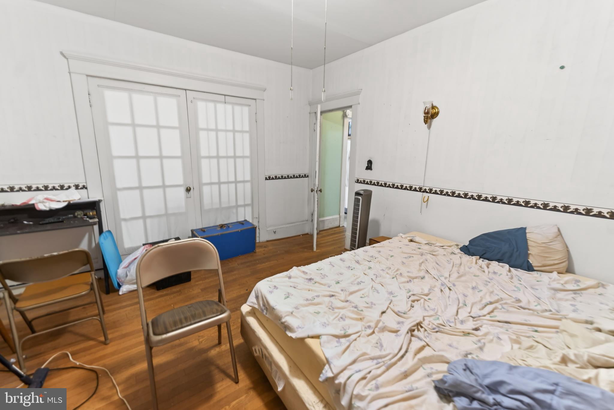 522 Market Street Denton, MD 21629 - Photo 36 of 49 a bedroom with a bed and furniture