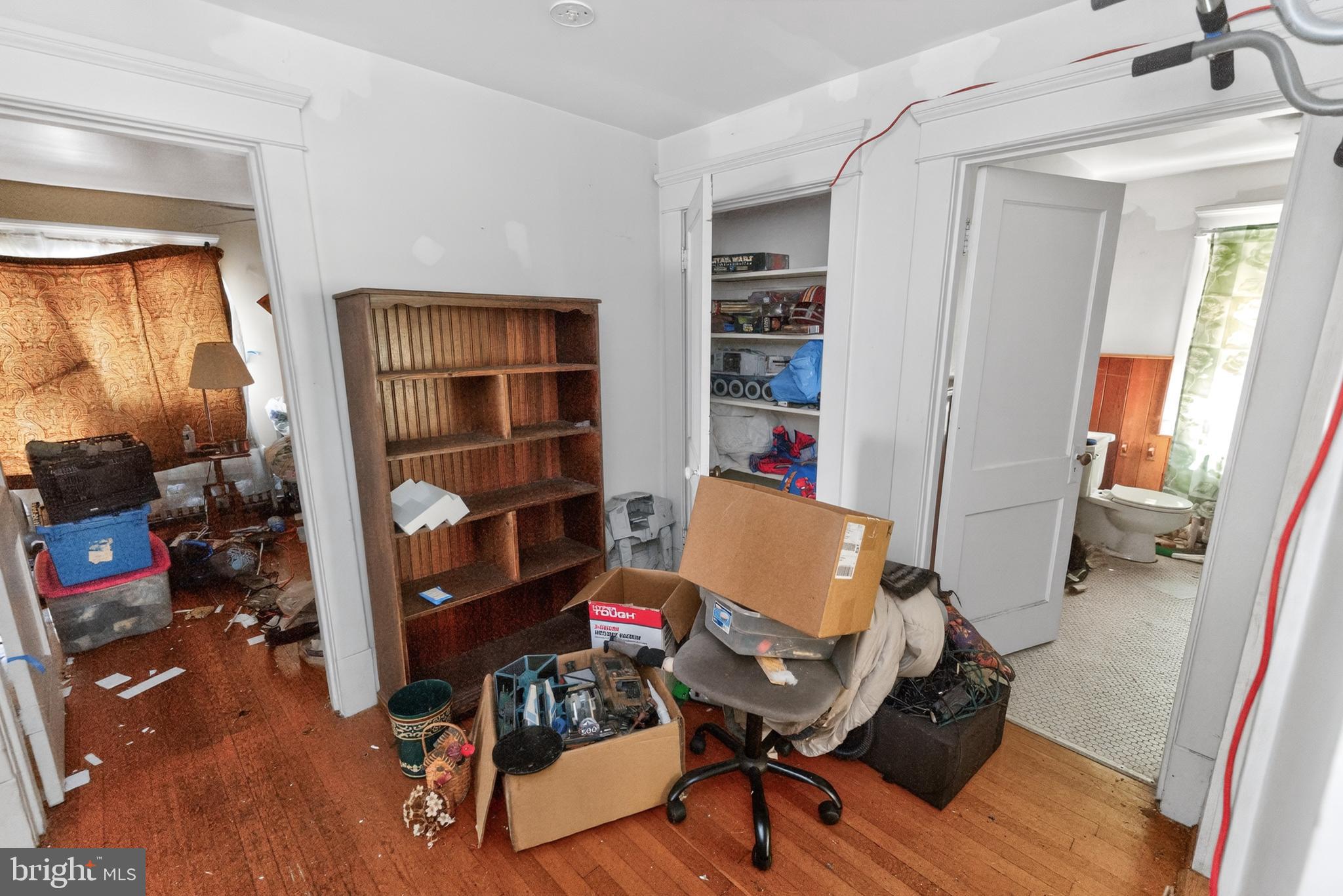 522 Market Street Denton, MD 21629 - Photo 41 of 49 a workspace with furniture hardwood and a window