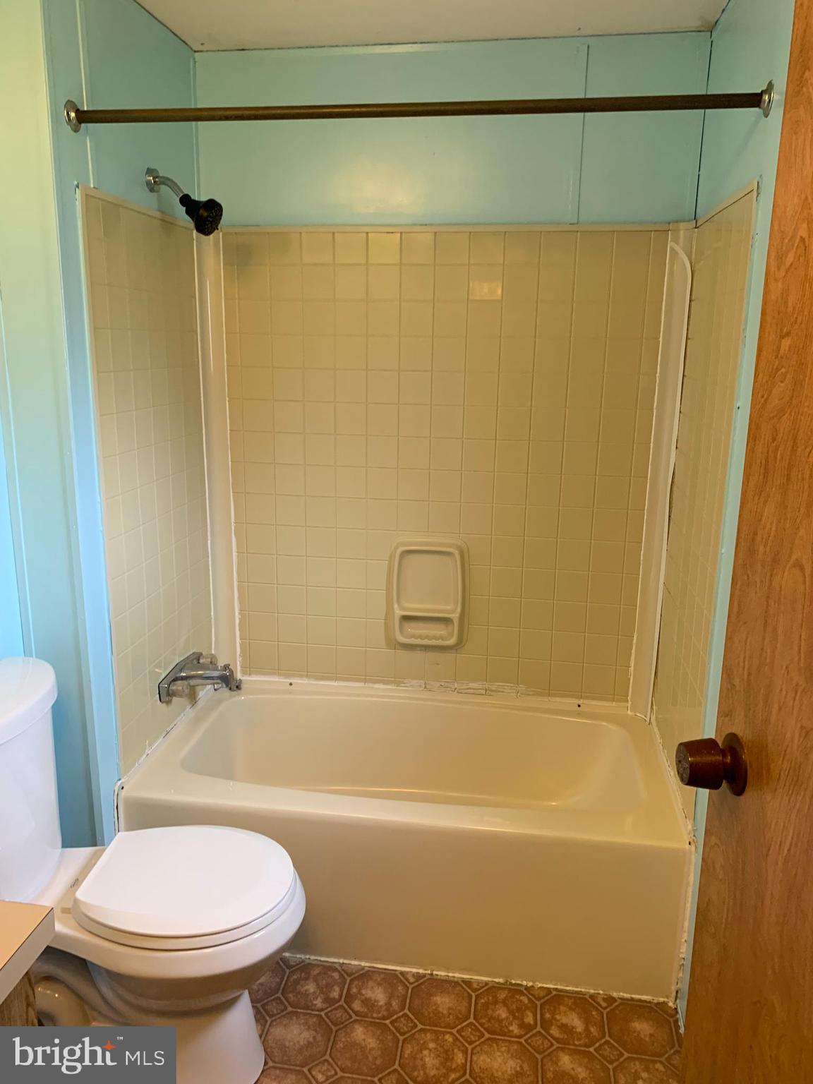 901 South Spring Garden Street, Unit 67 Carlisle, PA 17015 - Photo 20 of 26 a bathroom with a sink and a toilet