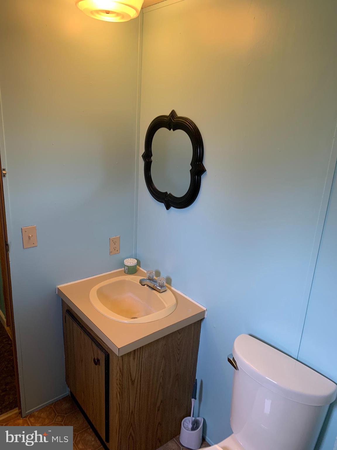 901 South Spring Garden Street, Unit 67 Carlisle, PA 17015 - Photo 21 of 26 a bathroom with a sink and a vanity