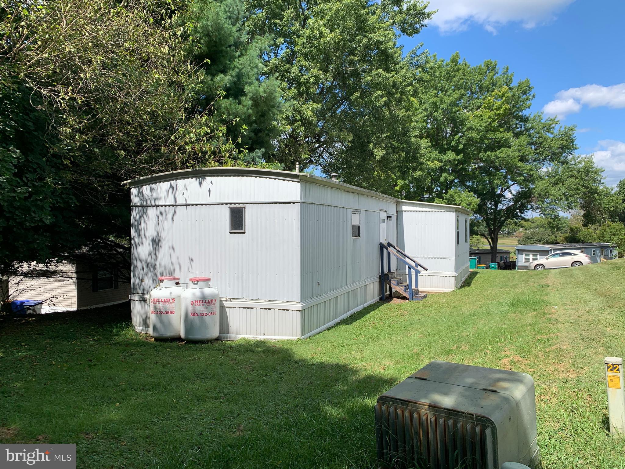 901 South Spring Garden Street, Unit 67 Carlisle, PA 17015 - Photo 4 of 26 a view of a backyard with a garden and plants