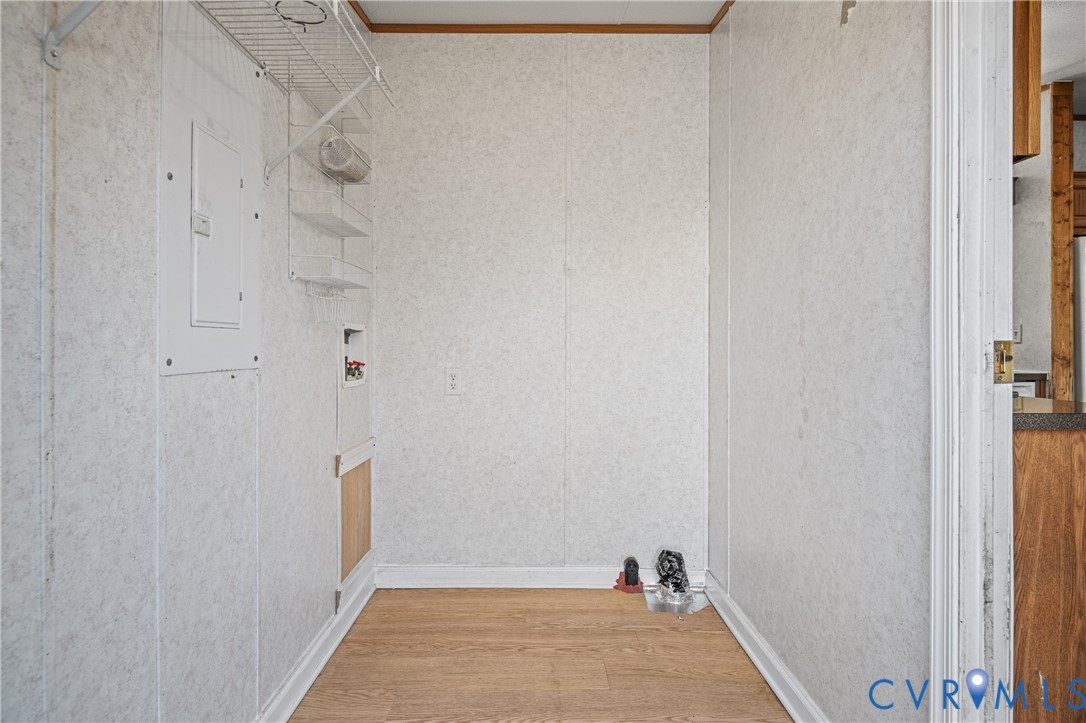 14306 Wilkinson Road Dewitt, VA 23840 - Photo 21 of 60 Wood-finish flooring with white baseboards, wall-m