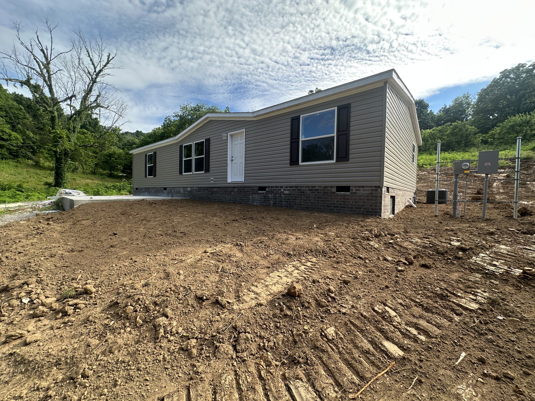 406 Shiloh Church Road Woodbury, TN 37190 - Photo 1 of 18 a view of a house with a yard