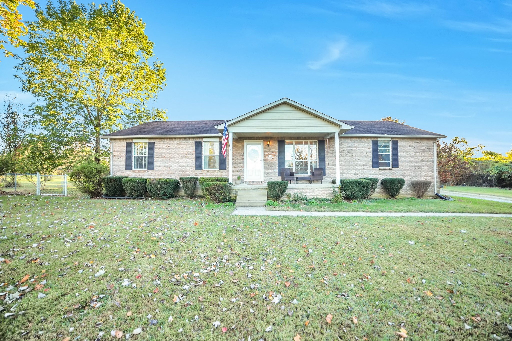 806 Old Gallatin Road Portland, TN 37148 - Photo 1 of 16 a front view of a house with a yard
