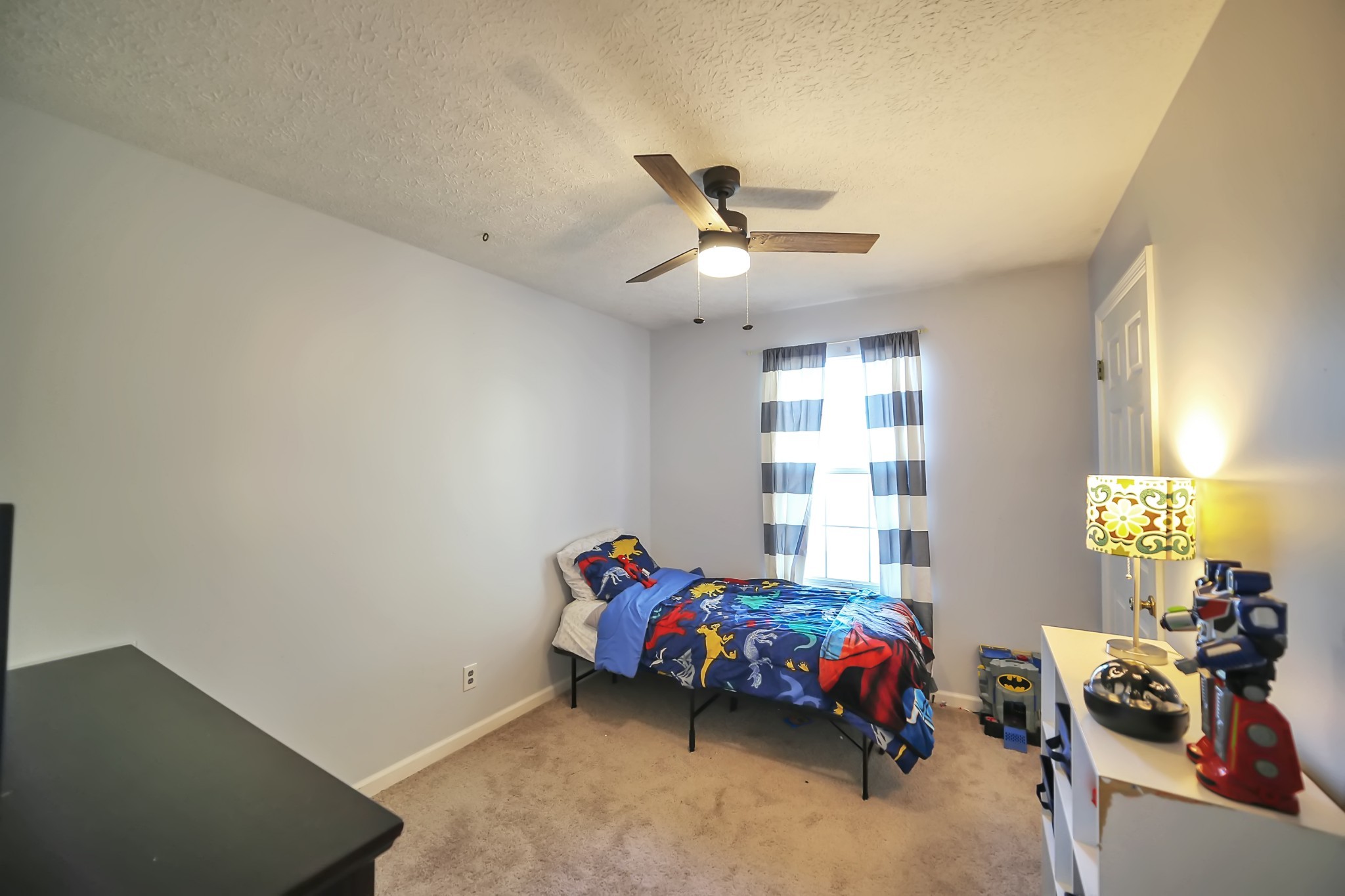 806 Old Gallatin Road Portland, TN 37148 - Photo 13 of 16 a bedroom with furniture and windows
