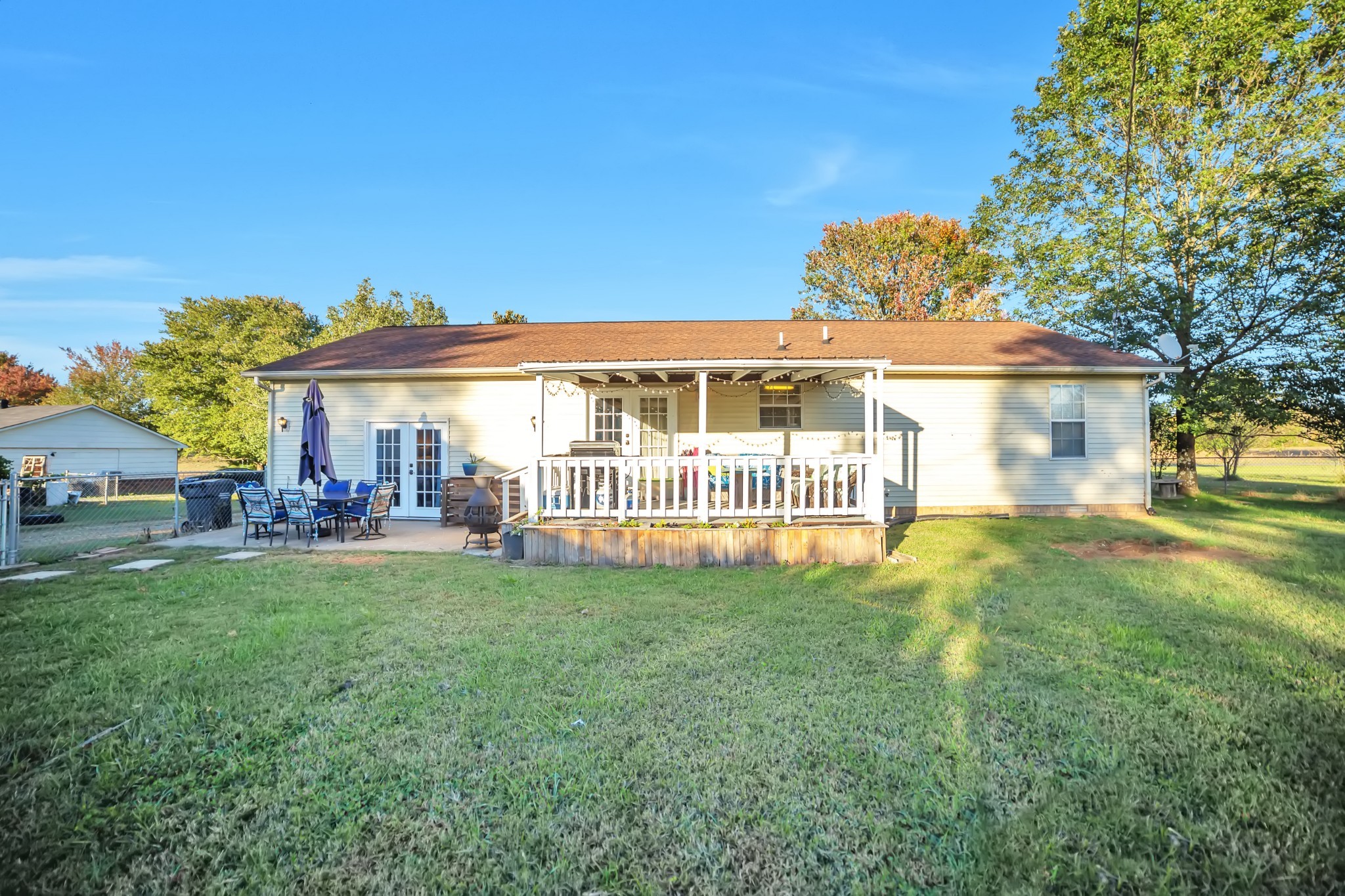 806 Old Gallatin Road Portland, TN 37148 - Photo 16 of 16 a view of a house with a yard and a patio
