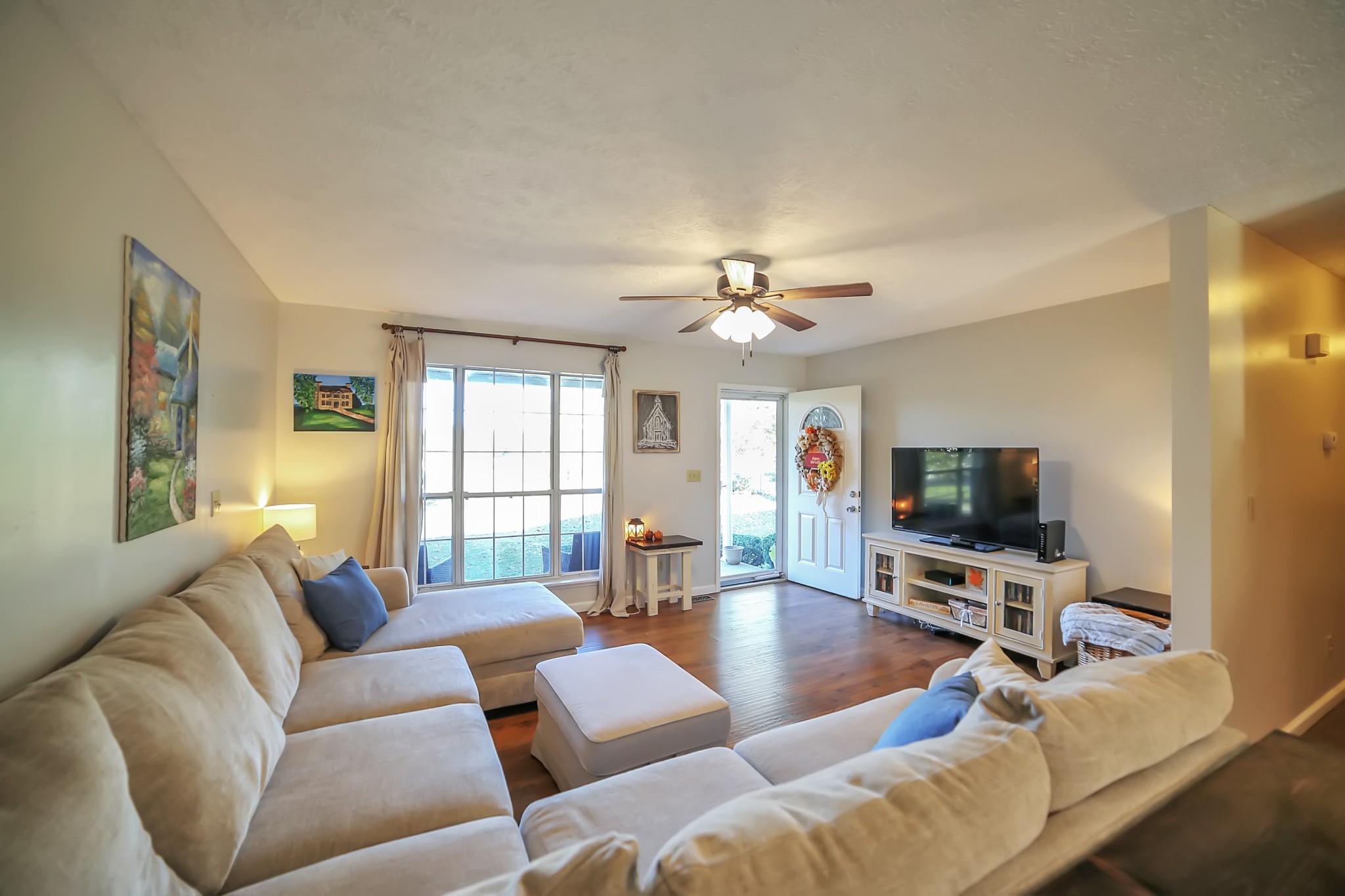 806 Old Gallatin Road Portland, TN 37148 - Photo 4 of 16 a living room with furniture and a flat screen tv
