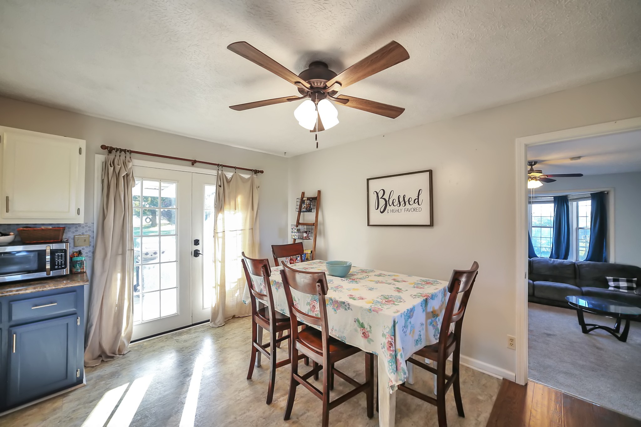 806 Old Gallatin Road Portland, TN 37148 - Photo 7 of 16 a view of a dining room with furniture window and wooden floor