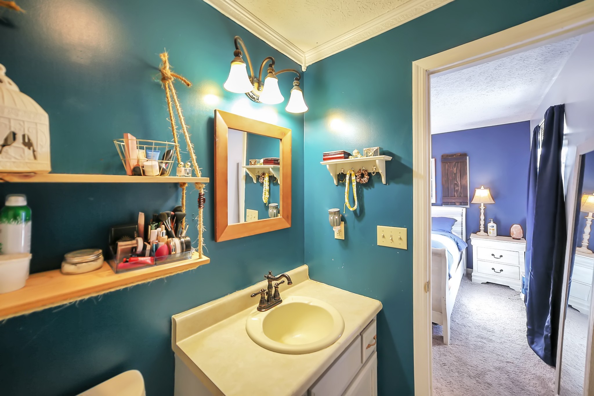 806 Old Gallatin Road Portland, TN 37148 - Photo 10 of 16 a bathroom with a sink mirror and vanity