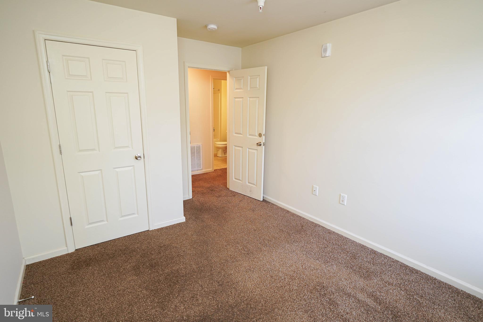 30630 Umes Boulevard, Unit V204 Princess Anne, MD 21853 - Photo 17 of 36 a view of an empty room