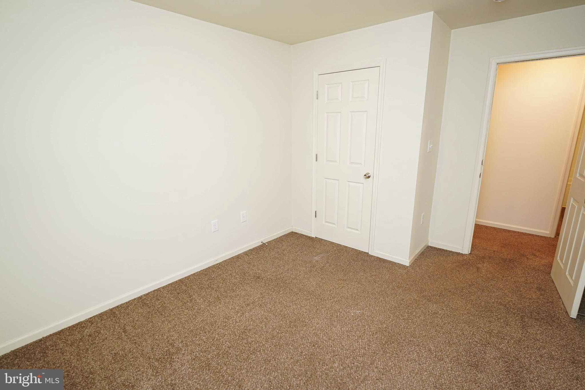 30630 Umes Boulevard, Unit V204 Princess Anne, MD 21853 - Photo 23 of 36 a view of empty room