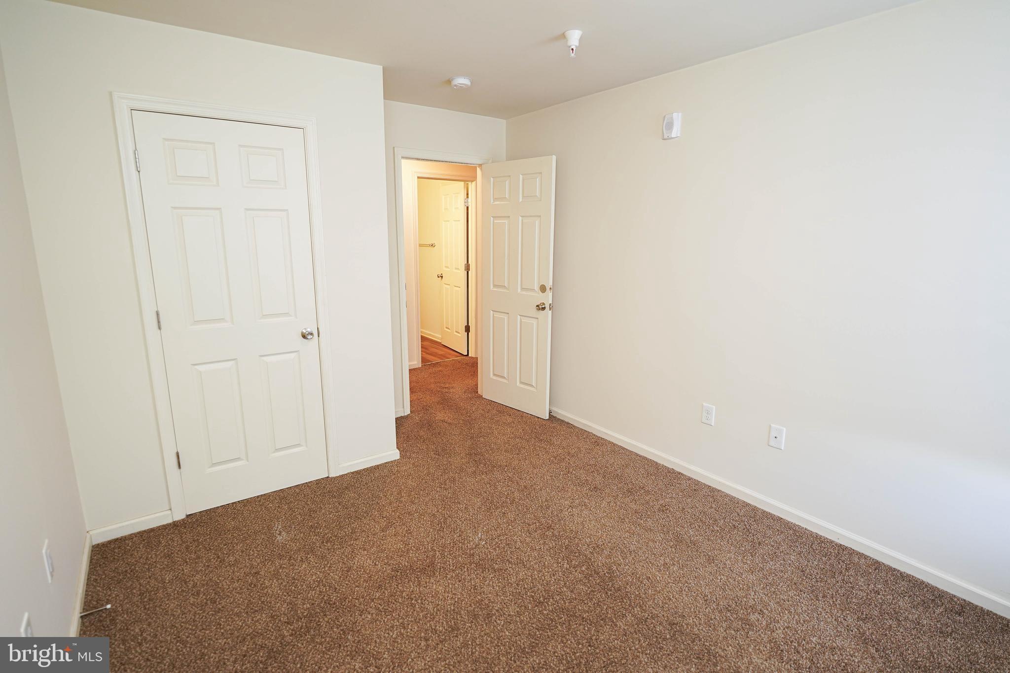 30630 Umes Boulevard, Unit V204 Princess Anne, MD 21853 - Photo 24 of 36 a view of an empty room