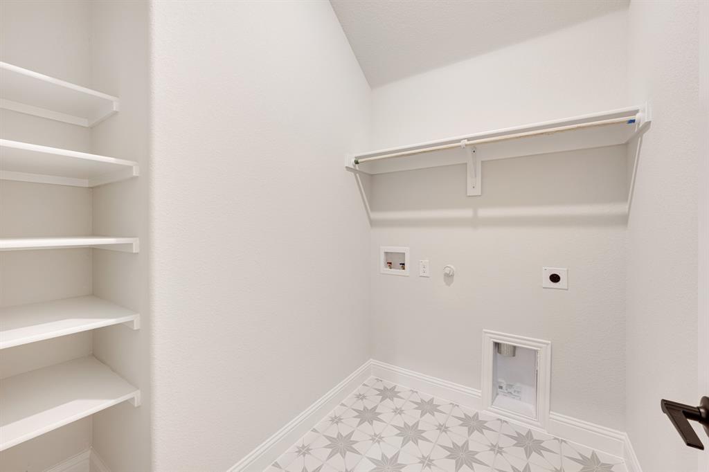 733 Seahawk Street Joshua, TX 76058 - Photo 16 of 35 a view of an empty walk in closet