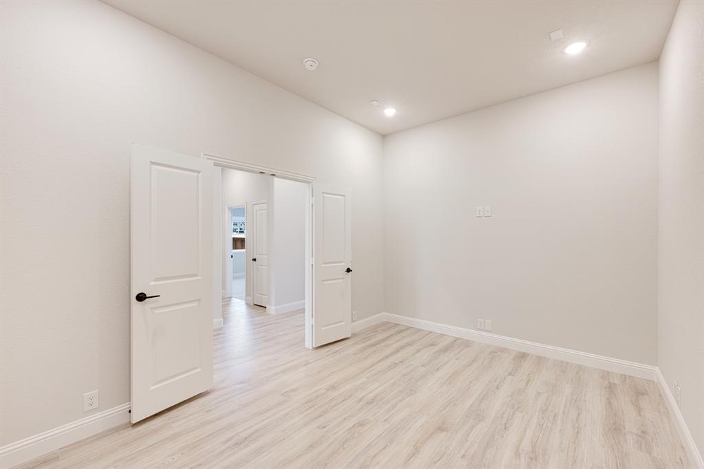 733 Seahawk Street Joshua, TX 76058 - Photo 10 of 35 a view of an empty room