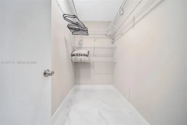 a view of small space with racks on the wall