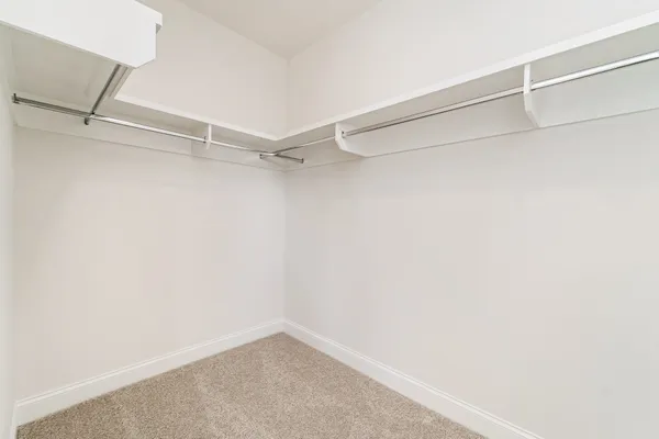 a view of an empty walk in closet
