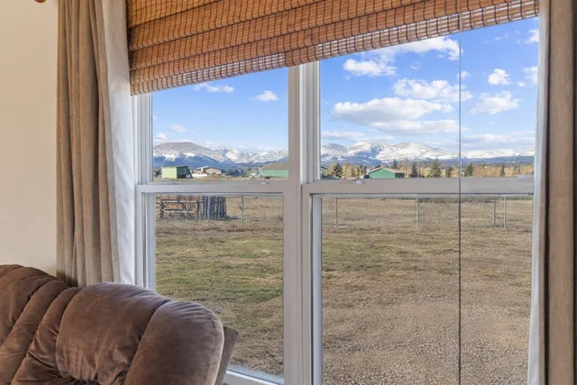 a view of a glass door and porch