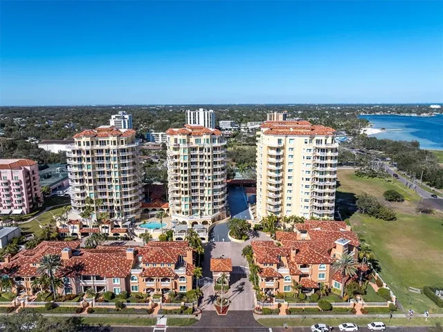 a view of city with ocean