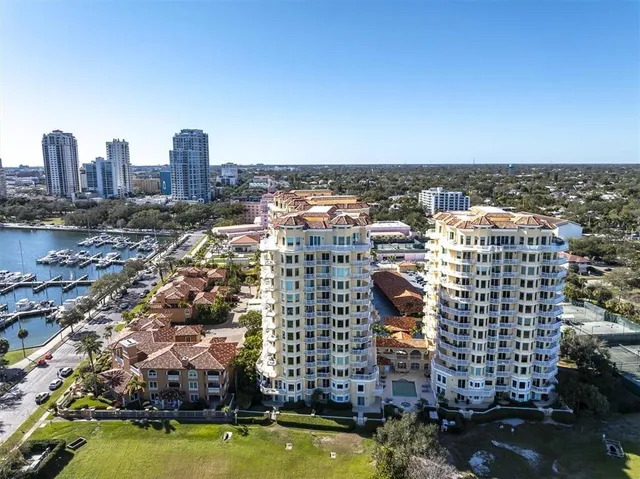 a view of a lake with a city from a balcony
