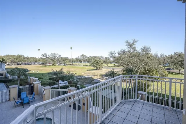 a view of a lake from a balcony