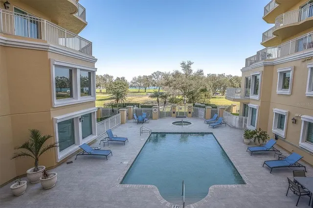 a view of a city with lawn chairs