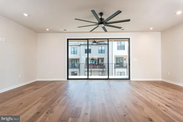 a bathroom with a double vanity sink a mirror and shower