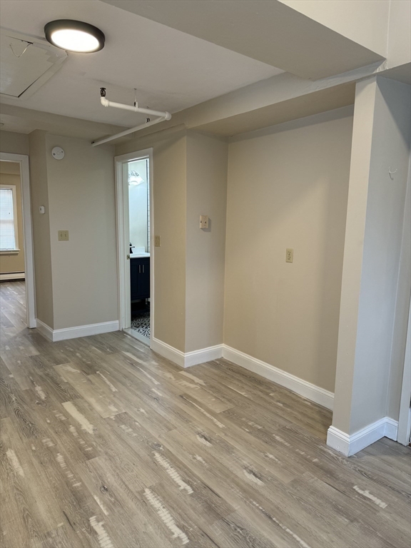 52 Washington Street, Unit 9 Marblehead, MA 01945 - Photo 13 of 17 a view of an empty room and wooden floor