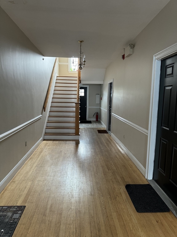 52 Washington Street, Unit 9 Marblehead, MA 01945 - Photo 14 of 17 a view of an entryway with wooden floor