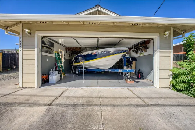 an aerial view of a house with a garden