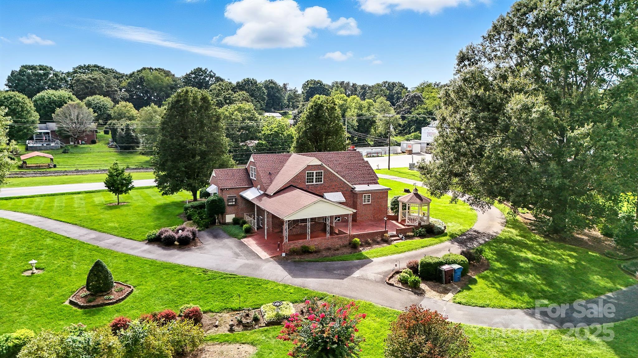 3968 Highway 321 Hudson, NC 28638 - Photo 20 of 47 an aerial view of a house with swimming pool garden and mountain view in back