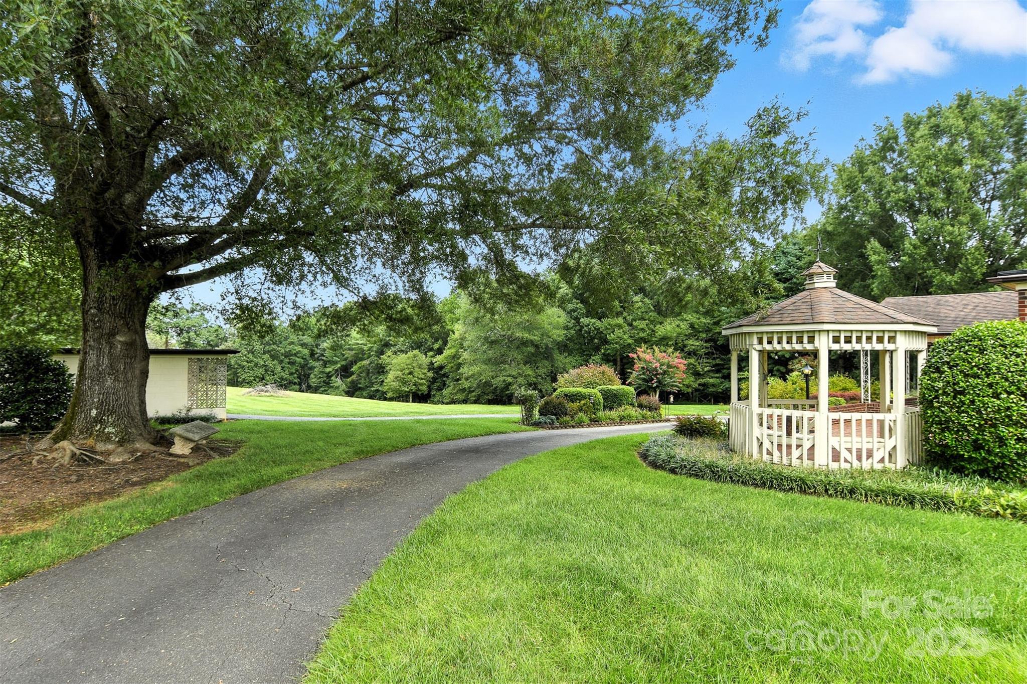 3968 Highway 321 Hudson, NC 28638 - Photo 21 of 47 a front view of a house with a yard