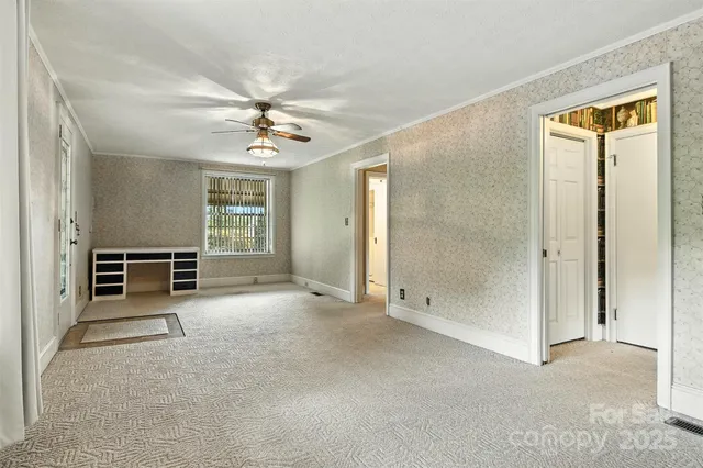 an empty room with windows