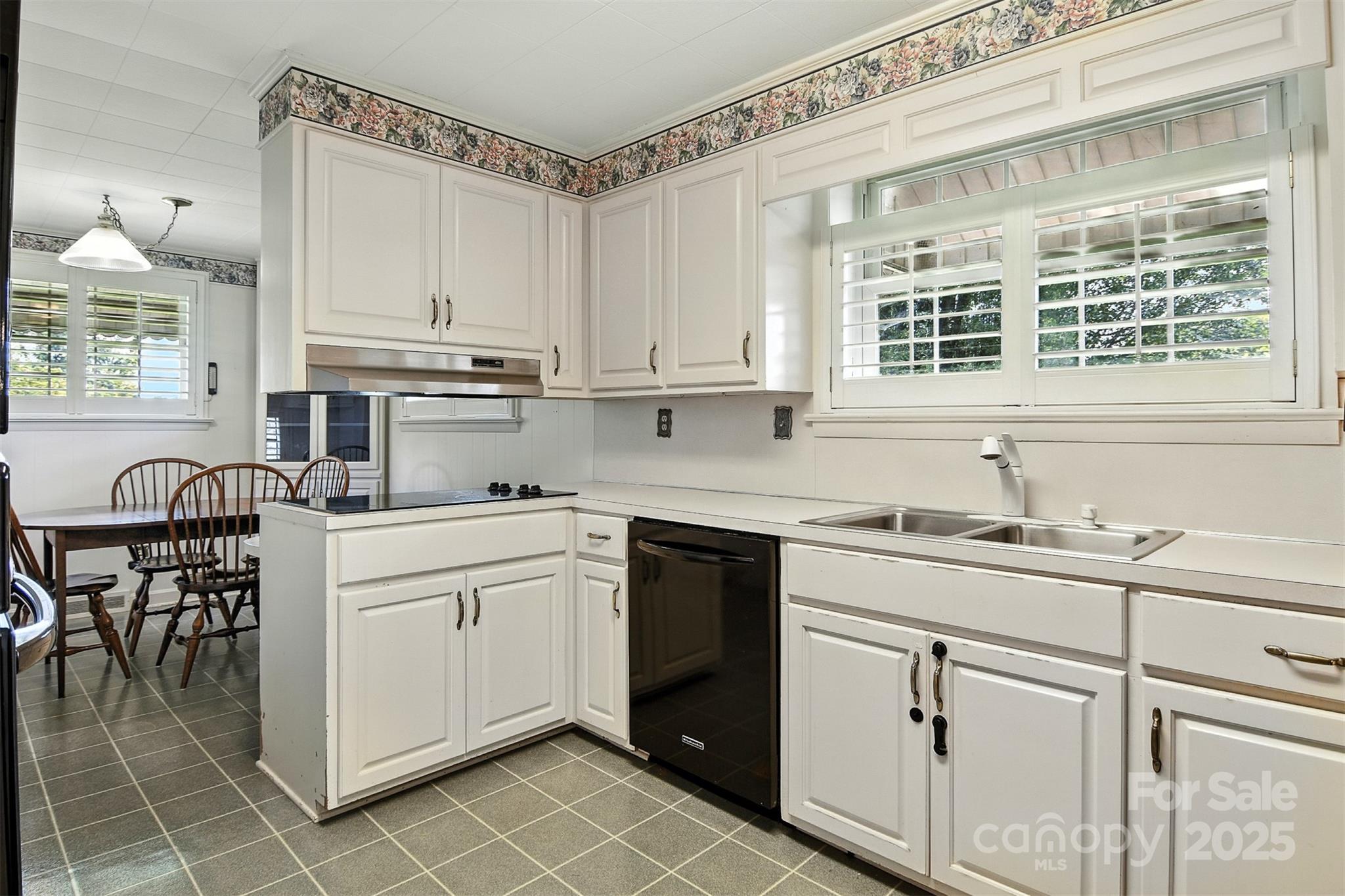 3968 Highway 321 Hudson, NC 28638 - Photo 29 of 47 a kitchen with appliances cabinets and a sink