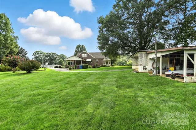 a view of a lake with a yard