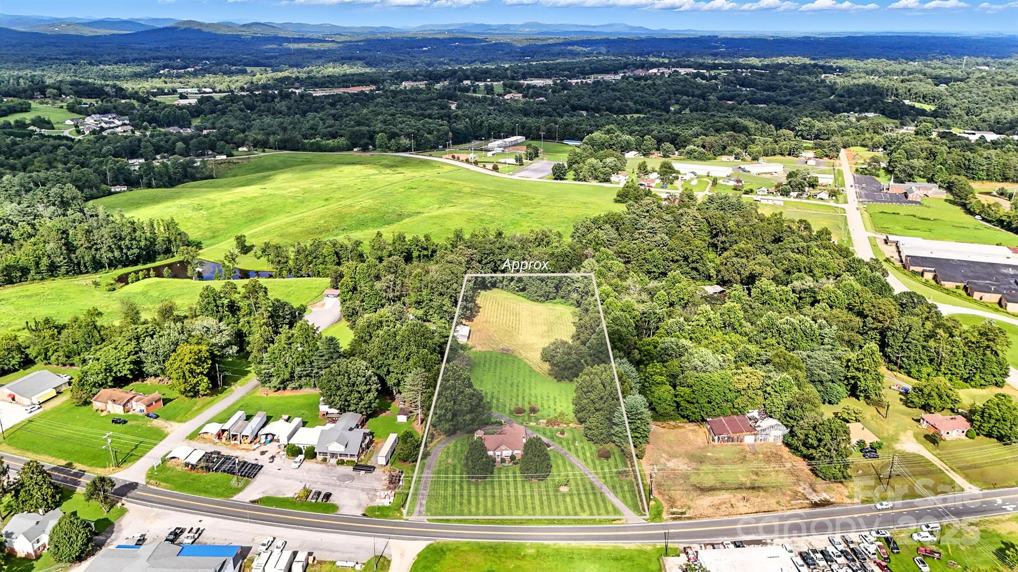 3968 Highway 321 Hudson, NC 28638 - Photo 42 of 47 a view of a lake with a yard