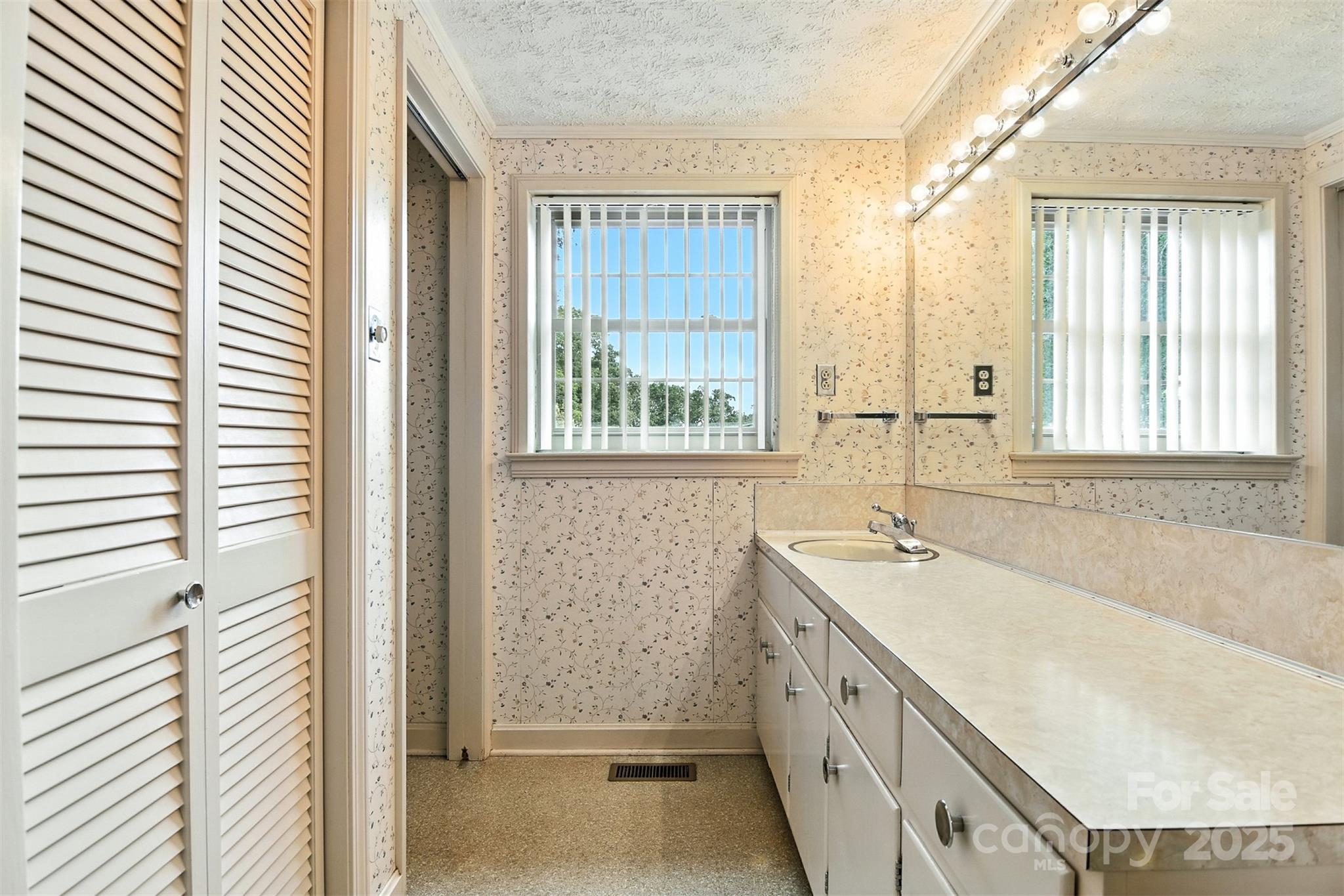 3968 Highway 321 Hudson, NC 28638 - Photo 10 of 47 a bathroom with a granite countertop sink and a bathtub