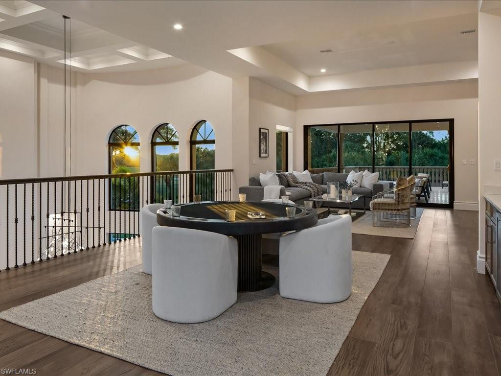2581 Escada Drive Naples, FL 34109 - Photo 25 of 39 a kitchen with sink and refrigerator